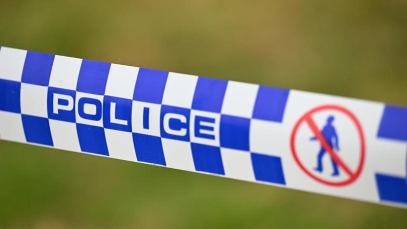 A woman has been found dead and a man is in custody after a house fire in Perth's southern suburbs. (James Ross/AAP PHOTOS)