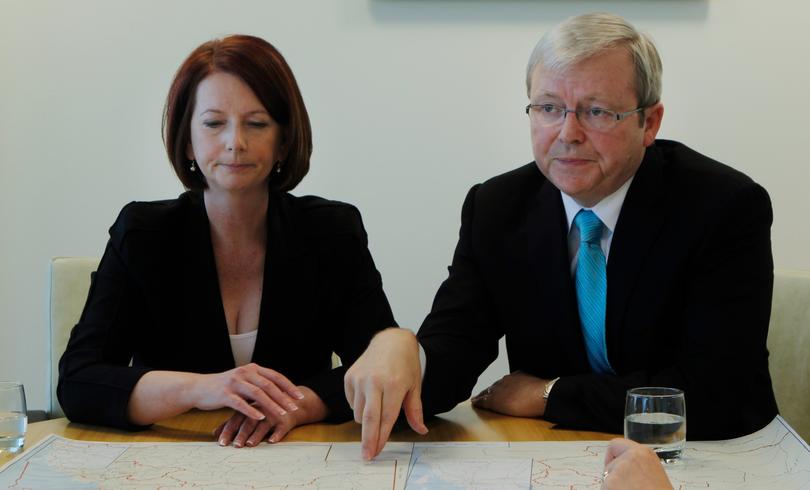 Prime Minister Julia Gillard (left) meets with her predecessor Kevin Rudd at the commonwealth offices in Waterfront House, Brisbane, Saturday, Aug. 7, 2010. Ms Gillard met with Mr Rudd at a meeting where media access was rigidly controlled. (AAP Image/Farifax Pool, Andrew Meares) NO ARCHIVING