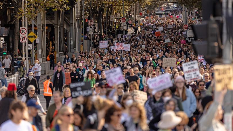 People march towards Federation Square during a rally against women's violence in Melbourne.