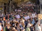 People march towards Federation Square during a rally against women's violence in Melbourne.
