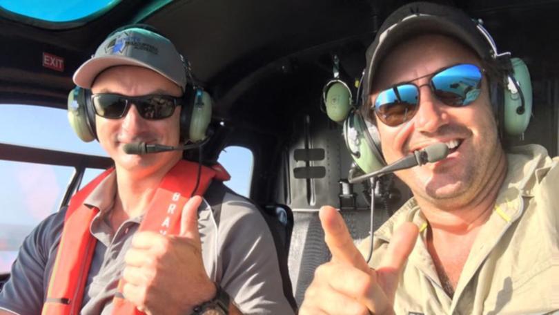 Outback Wrangler Matt Wright and pilot Michael Burbidge were charged in relation to the investigation into the fatal Northern Territory chopper crash that killed Chris Wilson in February 2022.