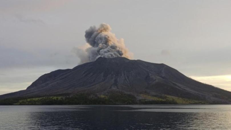 Following an eruption earlier this month, Mount Ruang is again spewing ash and lava. (AP PHOTO)