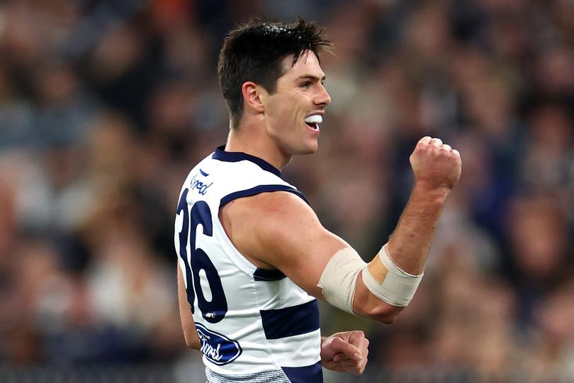 MELBOURNE, AUSTRALIA - APRIL 27: Oliver Henry of the Cats celebrates kicking a goal during the round seven AFL match between Geelong Cats and Carlton Blues at Melbourne Cricket Ground, on April 27, 2024, in Melbourne, Australia. (Photo by Quinn Rooney/Getty Images)