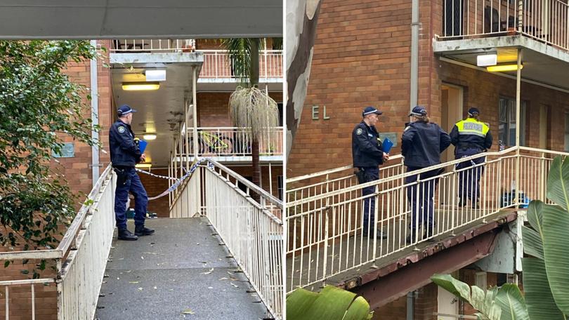 Police at the apartment where a 19-year-old woman was found dead.