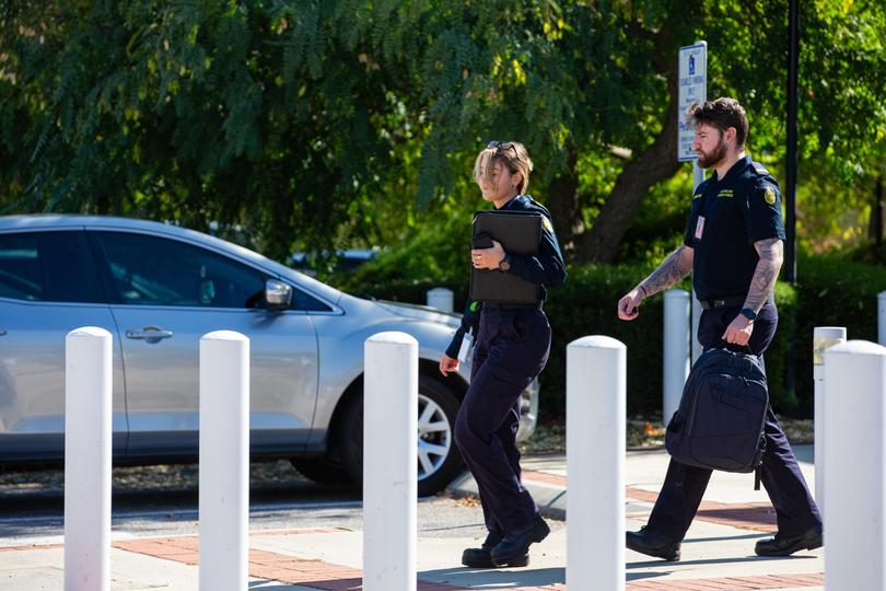 Border Force officers outside Joondalup Courthouse on Monday, when Mr Jamshidi Doukoshkan faced court on his latest charges.