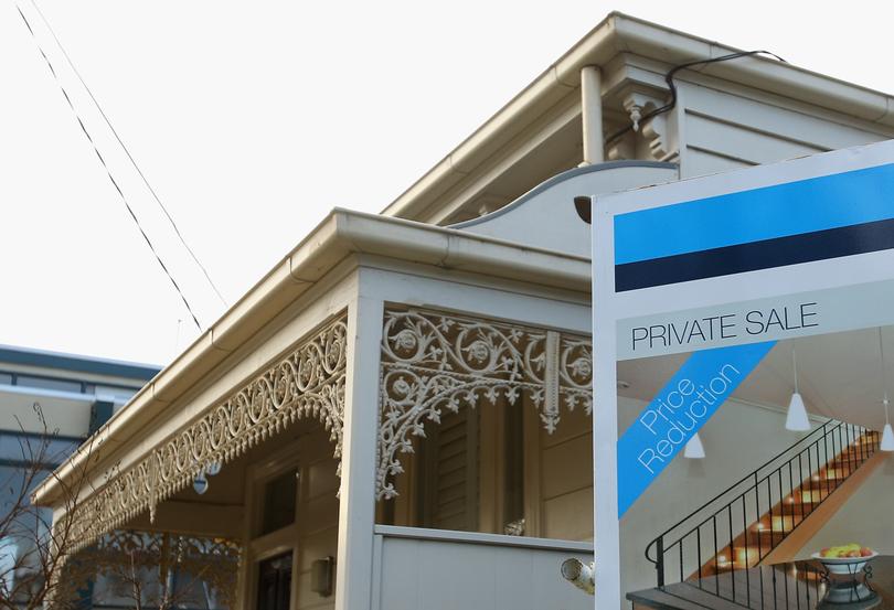 MELBOURNE, AUSTRALIA - JUNE 17:  A sale board stands out the front of a property in Middle Park on June 17, 2011 in Melbourne, Australia. RP Data figures released this week reveal that the country's wealthiest suburbs have been worst affected by the housing market Downturn, with median house prices in these neighbourhoods dipping up to 43% since peaking in 2008. Worst affected areas include: WA's Mosman Park and East Fremantle, NSW's Hunters Hill and Mosman and Melbourne, Victoria.  (Photo by Quinn Rooney/Getty Images)