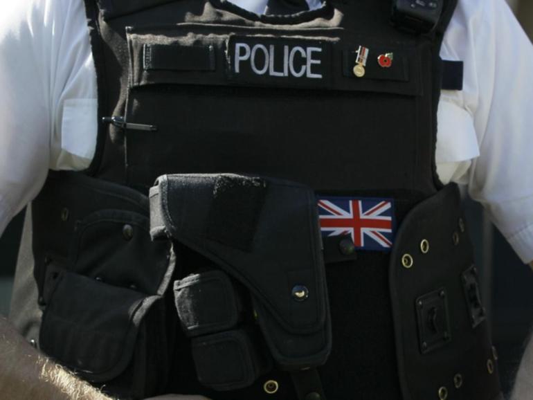 A UK police officer has been charged after he allegedly published an image in support of Hamas. (AP PHOTO)