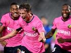 Jacob Farrell (c) celebrates after scoring the Mariners' opening goal against Adelaide United. 
