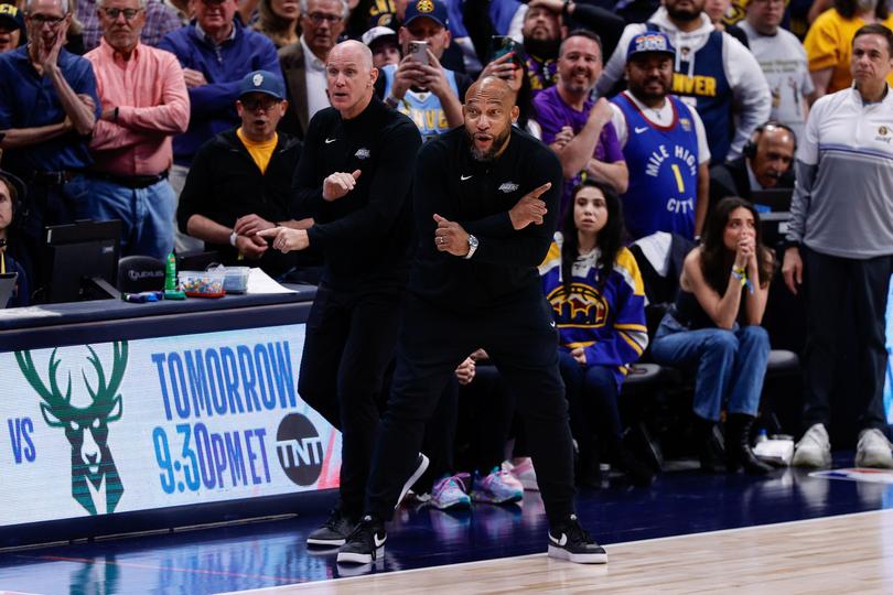 Head coach Darvin Ham, right, with assistant coach Chris Jent behind him. Ham’s future is in serious doubt after the Lakers’ unflattering finish to the season.