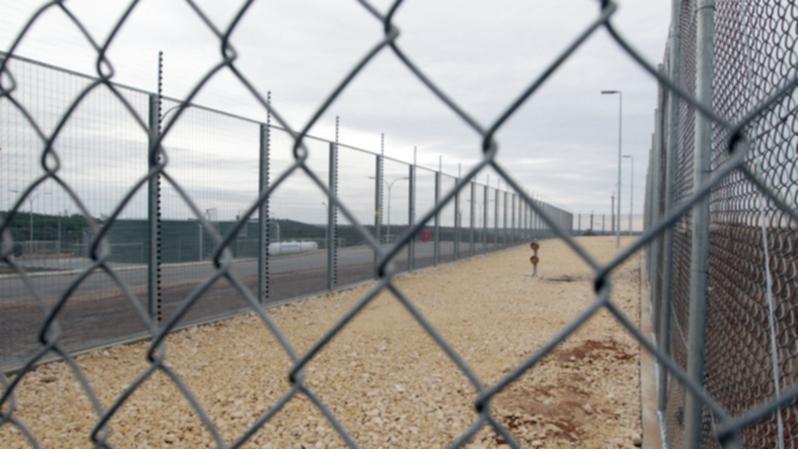 A former immigration detainee will appear in court charged with breaching his curfew.