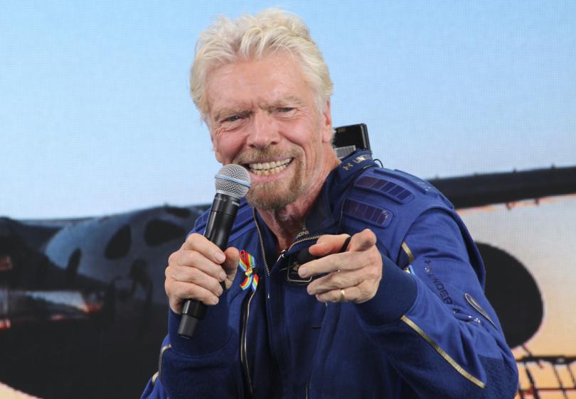 Richard Branson answers students' questions during a news conference at Spaceport America near Truth or Consequences, N.M., on Sunday, July 11, 2021. Branson and five crewmates from his Virgin Galactic space tourism company reached an altitude of about 53 miles (88 kilometers) over the New Mexico desert before safely gliding back home to a runway landing at Spaceport America. (AP Photo/Susan Montoya Bryan)