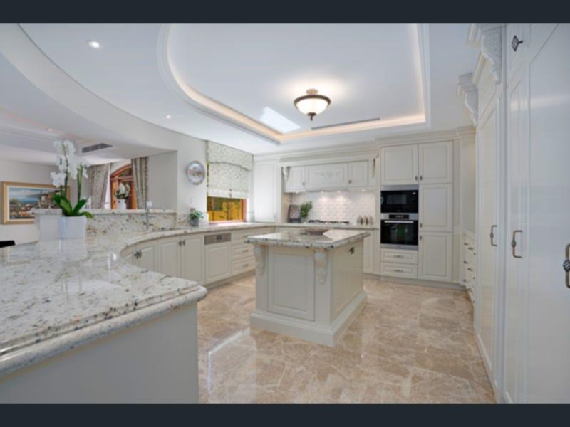 One of the four kitchens at the Applecross mansion recently listed for sale.