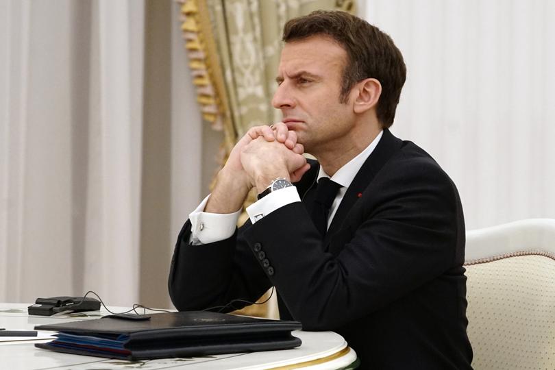 French President Emmanuel Macron listens to Russian President Vladimir Putin during their meeting in the Kremlin in Moscow, Russia, Monday, Feb. 7, 2022. Macron traveled to Moscow in a bid to help defuse tensions amid a Russian troop buildup near Ukraine that fueled fears of an invasion. (Sputnik, Kremlin Pool Photo via AP)