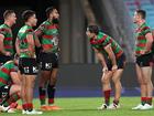 Rabbitohs players react after a Panthers try. 
