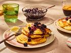 Lemon ricotta pancakes in New York, Jan. 11, 2022. Genevieve Ko whips ricotta into the batter and skips the stiff egg whites for a recipe thats as effortless as it is comforting. Food styled by Susie Theodorou. Props styled by Paige Hicks. (Jenny Huang/The New York Times)
