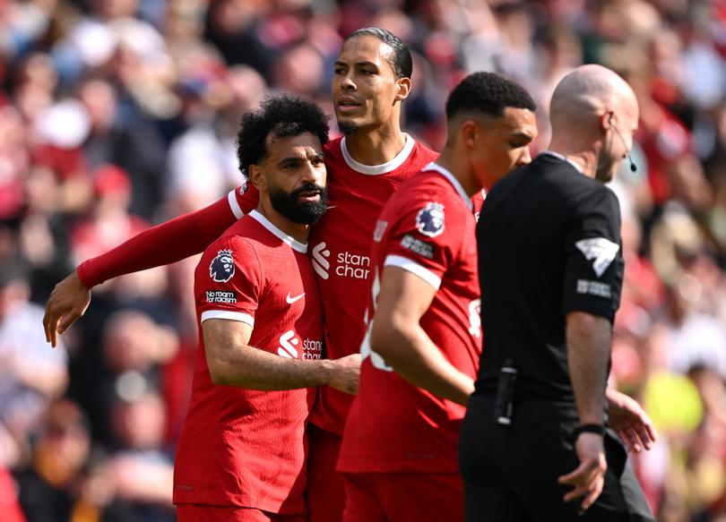 LIVERPOOL, ENGLAND - MAY 05: Mohamed Salah of Liverpool celebrates scoring his team's first goal with teammate Virgil van Dijk during the Premier League match between Liverpool FC and Tottenham Hotspur at Anfield on May 05, 2024 in Liverpool, England. (Photo by Stu Forster/Getty Images)