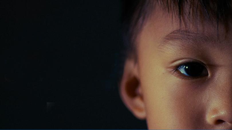 A scene from one of International Justice Mission's films about Aaron, a child rescued from 'pay per view' child exploitation purveyors.