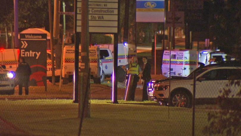 Police at the scene of the stabbing on Saturday night.