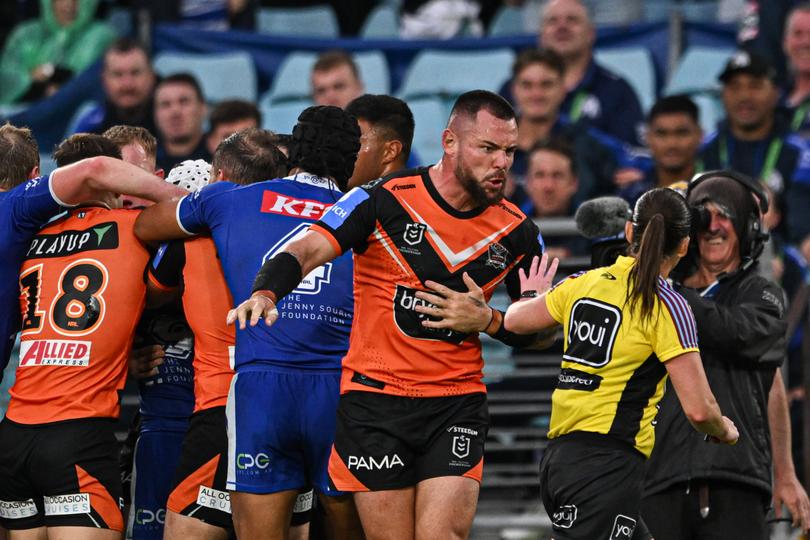 David Klemmer of the Tigers reacts after being sin binned by Kasey Badger.