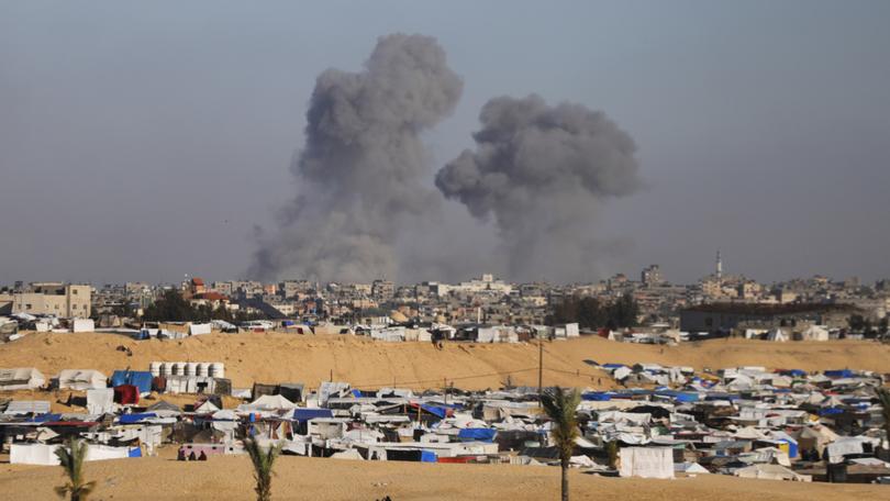 Smoke rises following an Israeli airstrike east of Rafah, Gaza Strip.