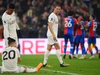 Jonny Evans of Manchester United looks dejected as he looks back towards Casemiro and Diogo Dalot after Tyrick Mitchell of Crystal Palace (not pictured) scored his team's third goal.