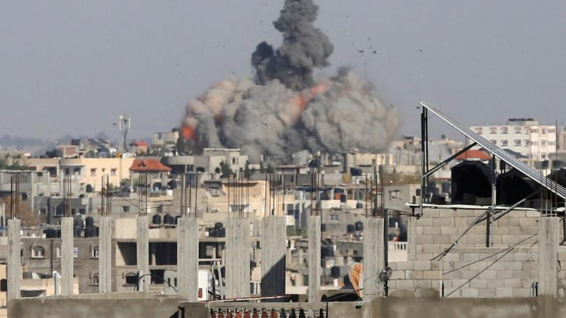 Smoke rises following Israeli strikes in Rafah.