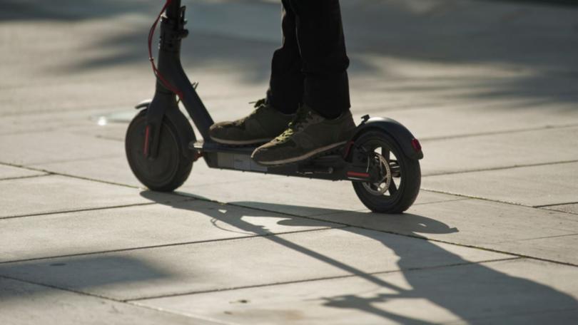 Police are hunting a man they say deliberately mowed down an elderly woman with an e-scooter, leaving her unconscious..