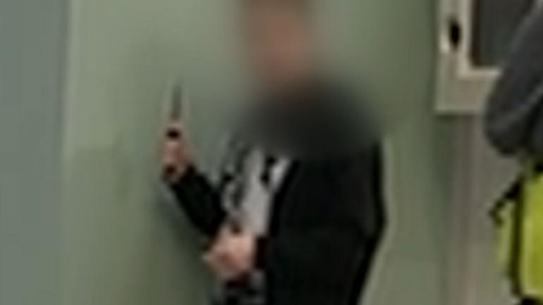 Footage of the incident shows the teenager standing in a corner of the Lake Haven shopping centre, surrounded by security.