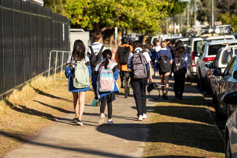 Teenage Police Shooting: Students arrive at Rossmoyne SHS this morning.