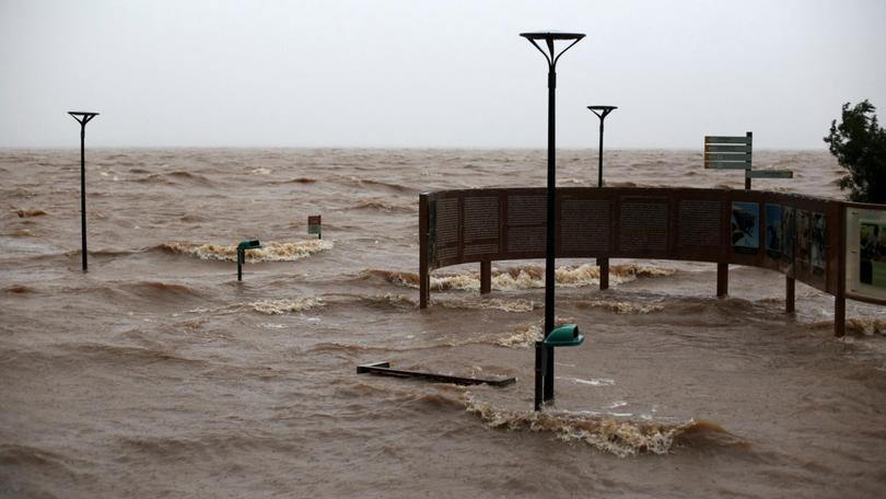 View of the flooded Lake Guaiba as a storm brews in Porto Alegre, Rio Grande do Sul state, Brazil.