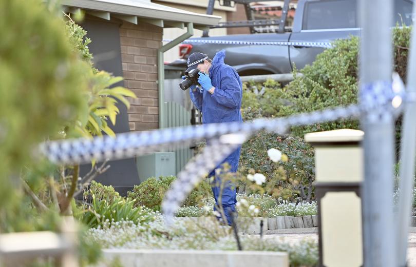 Police at Sandpiper Loop, Yangebup where the body of a woman was found this morning. Joan Mary Drane, 78, was murdered by her adult son Andre Lafayette Drane. 