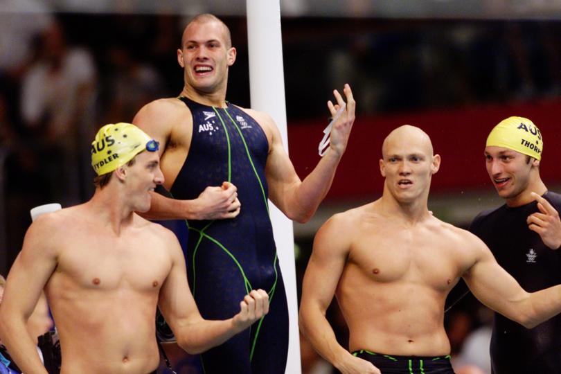 DIGICAM 2862 Aquatics. Swimming.vjc000916.002.0011
M400x 100 freestyle final final...Swimming finals at Sydney Aquatic Ctr.
Pic Vince Caligiuri , Fairfax....The Australian team celebrate winning gold medal in record time , Michael Klim , Ian Thorpe , Chris Fydler and Ashley Callus
WAN ONLINE OUT