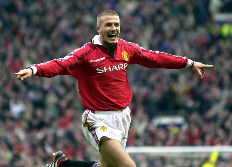 Manchester United's David Beckham celebrates his goal against West Ham United during their FA Premiership match at Old Trafford in Manchester Saturday, April 1, 2000. 