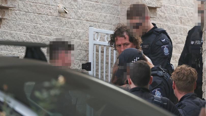 Police raid the Karrinyup home of Troy Mercanti.