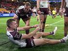 Manly fullback Tom Trbojevic in pain after straining a hamstring in the 30-24 loss to the Dolphins. (Dave Hunt/AAP PHOTOS)
