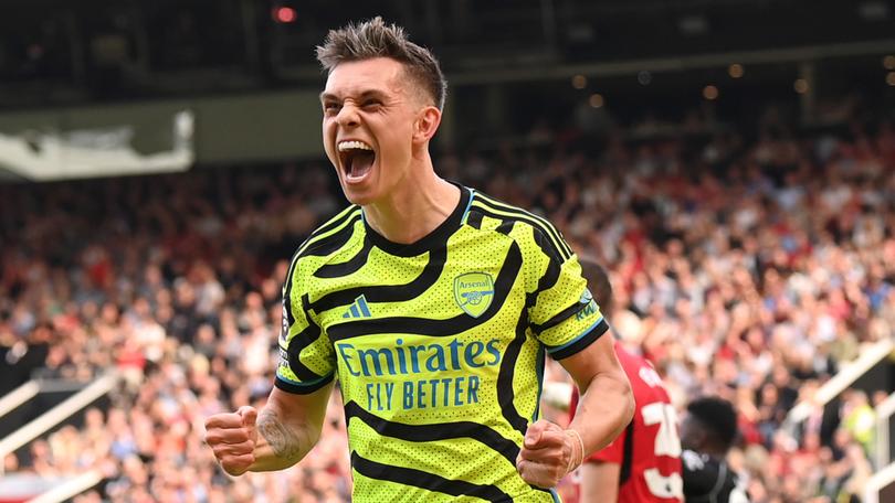 Leandro Trossard celebrates scoring the only goal of the game.