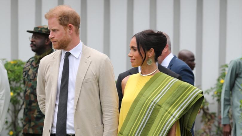 Britain's Prince Harry, Duke of Sussex, and Meghan, Duchess of Sussex, visit the Lagos State Governor's Office.