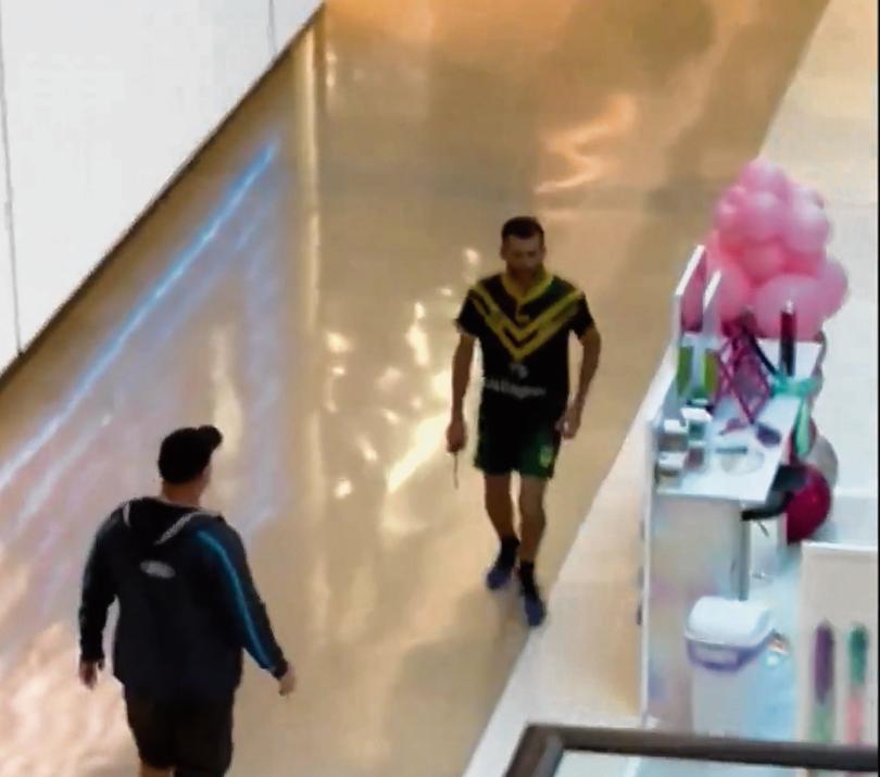 One widely-shared clip from inside the Westfield showed a man step between Cauchi and a fleeing mother and two young girls making the knifeman veer away.