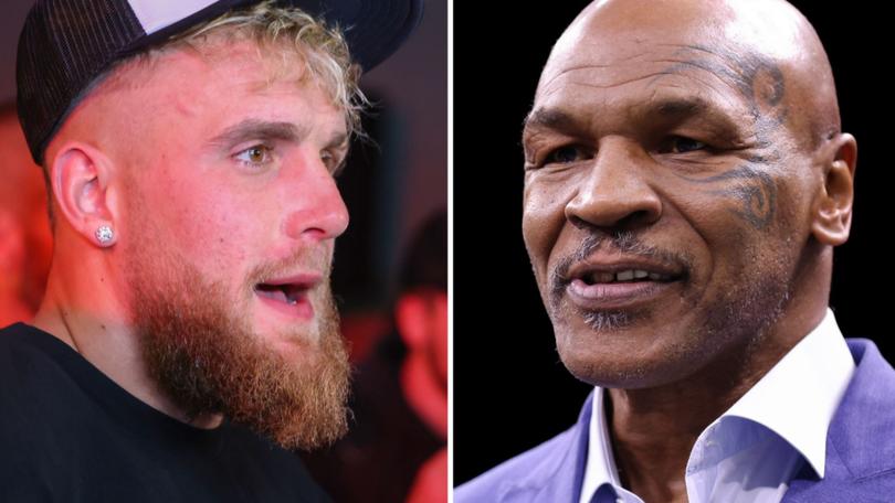 Boxers Jake Paul (L), and Mike Tyson (R).