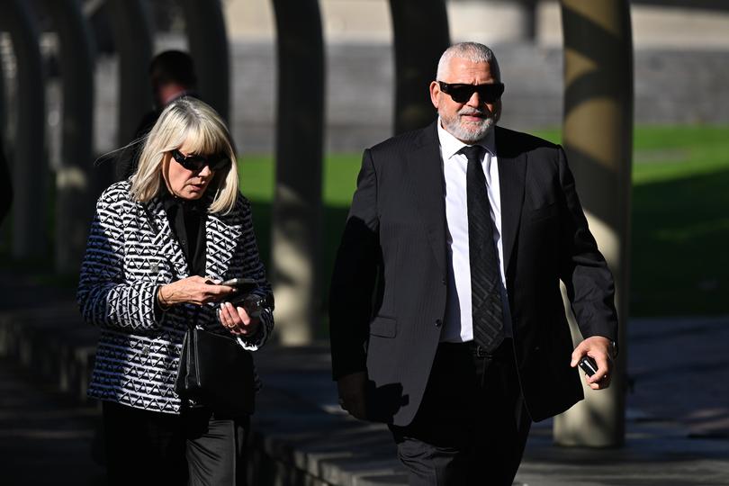 Mick Gatto (right) arrives to the State Memorial Service for Harold Mitchell AC at Hamer Hall, in Melbourne, Monday, May 13, 2024.