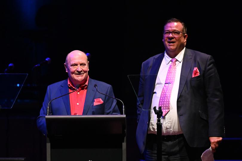 Allen Scash and Nick Swifte speak during a State Memorial Service for Harold Mitchell AC at Hamer Hall, in Melbourne, Monday, May 13, 2024. Advertising veteran and philanthropistÊHaroldÊMitchell died aged 81. (AAP Image/James Ross) NO ARCHIVING