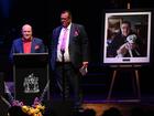 Allen Scash and Nick Swifte speak during a State Memorial Service for Harold Mitchell AC at Hamer Hall, in Melbourne, Monday, May 13, 2024. 