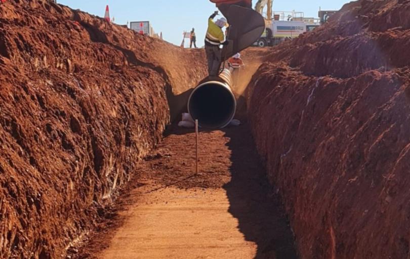 The raw water pipeline being installed.