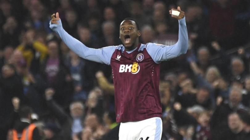 Colombian striker Jhon Duran celebrates after scoring one of Villa's three goals against Liverpool. (AP PHOTO)