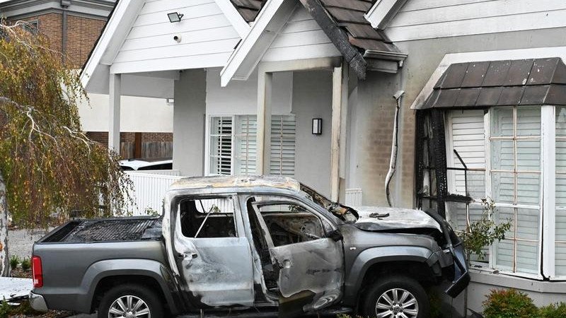 One of the burnt out cars at a house in McCracken Street, Essendon. (James Ross/AAP PHOTOS)