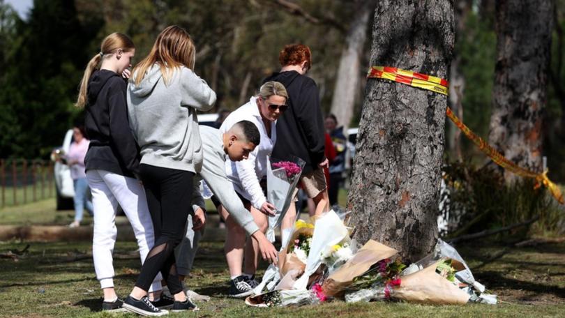 Flowers at scene of fatal car crash.