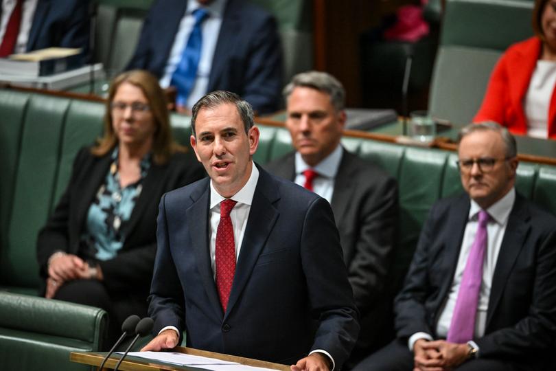 CANBERRA, AUSTRALIA - MAY 14: Australia’s Treasurer Jim Chalmers delivers his budget speech at Parliament House on May 14, 2024 in Canberra, Australia. Australia's Labor government is grappling with a slowing economy, weaker commodity prices, soaring housing costs and a softening labor market as it prepares to unveil its federal budget on May 14. To counter these headwinds, the budget is expected to feature smaller revenue upgrades compared to recent years, while outlining the government's interventionist policies aimed at boosting domestic manufacturing and the transition to green energy. Critics warn that such industrial policies risk fueling inflation and diverting resources from more productive sectors of the economy. The budget is seen as a key opportunity for the Labor government to deliver broad economic support that analysts say is fundamental to re-election chances next year. (Photo by Tracey Nearmy/Getty Images)