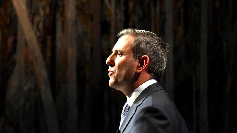 The Great Hall tapestry is seen behind Australian Treasurer Jim Chalmers as he delivers his post-budget address to the National Press Club in Canberra, Wednesday, May 16, 2024. (AAP Image/Lukas Coch) NO ARCHIVING Lukas Coch