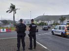 Extra French police have been sent to New Caledonia after rioters torched vehicles and businesses. (AP PHOTO)