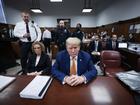 Former US president Donald Trump sits in the Manhattan criminal court.